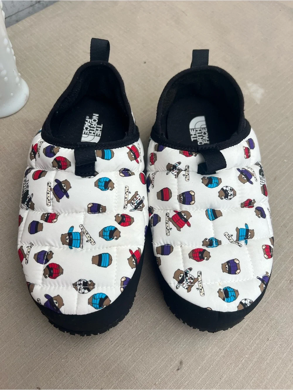 The North Face White Quilted Slip-On Slippers with Multicolor Bear Print